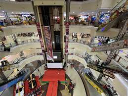 Nagoya Hill Mall Batam interior filled with shoppers and local stores.