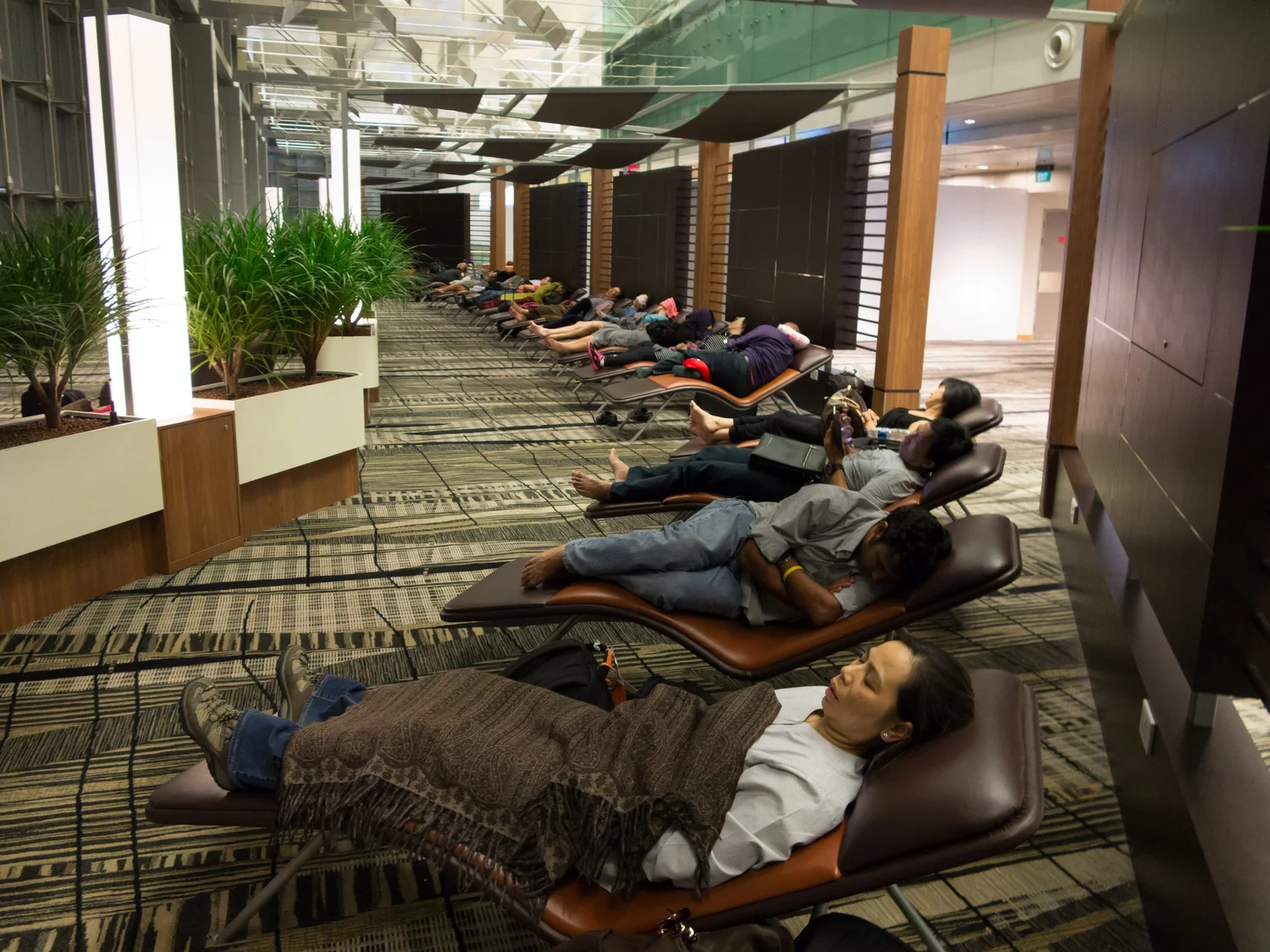 Traveler enjoying spa massage at Changi Airport Terminal 3.