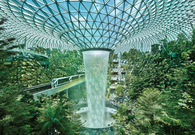 Jewel Changi Airport with indoor waterfall and lush garden
